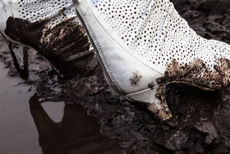 shoes destroyed in mud.